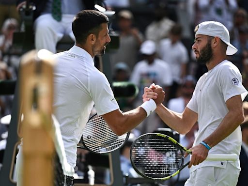 Murray saluted at Wimbledon despite doubles exit as Djokovic wins