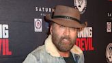 Nicolas Cage's bushy beard and cowboy hat are out in full force at movie premiere