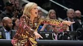 Of course LSU coach Kim Mulkey's outfit for NCAA championship is sequined tiger print