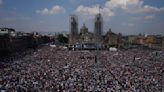 Mexico's president leads massive march in support of his government