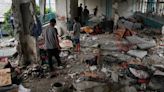 Photos: Israel attacks UN-run school in central Gaza, killing 37