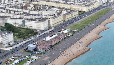 Drone pictures show thousands of revellers at seafront event
