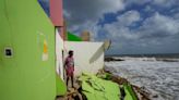 AP PHOTOS: In Sri Lanka, fishers suffer as sea erosion destroys homes and beaches
