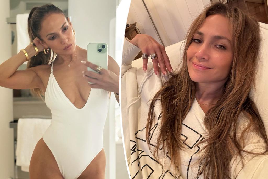 Jennifer Lopez looks casual in a sweatshirt and minimal makeup for fresh-faced selfie