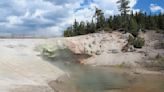 Yellowstone tourist spotted dipping fingers in steaming, acidic, green spring (yes, really)