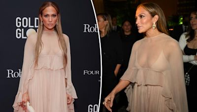 Jennifer Lopez covers up in sheer chiffon gown at TIFF party after wearing racy silver ‘revenge dress’