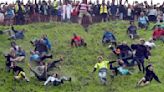 Chasing cheese wheels or lugging sacks of wool, UK competitors embrace quirky extreme races