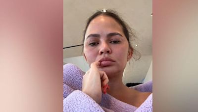 Chrissy Teigen Cozies Up at Home After Being Diagnosed With a 'Double Ear Infection'