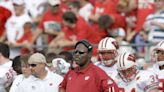 A longtime Wisconsin football staff member who helped develop some of the Badgers' best wide receivers gets a touching sendoff from NFL scouts