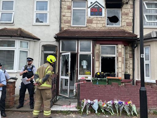 East Ham fire: Neighbours 'threw bricks' at windows to try and save family