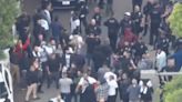 Videos show protesters brawling outside LA school meeting on whether to recognize LGBTQ Pride Month