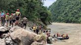 Rescuers recover body of Indian from two buses swept away in mudslide in Nepal | World News - The Indian Express