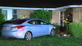 Car slams into living room with 2 inside, minor injuries reported