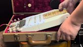 The James Bond of travel guitars: meet the briefcase guitar – an all-in-one amp and foldable Strat that packs into a tweed carry case