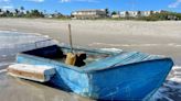 Possible migrant boat washes ashore in Melbourne Beach with rusty engine, no occupants