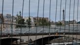 Paris police sealing off Seine River ahead of Olympics opening ceremony