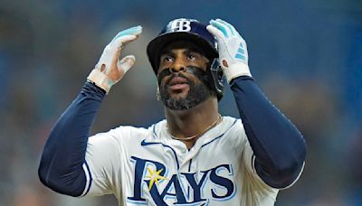 Díaz hits a 2-run homer to complete an 8-run 4th inning and the Rays beat the Twins 9-4