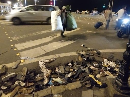 Broken barricades, abandoned footwear: Remanents of Team India victory parade along Marine Drive