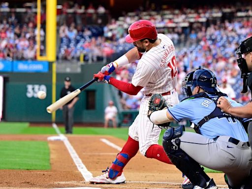 Phillies’ Kyle Schwarber hits record leadoff home run, leaves game with elbow injury