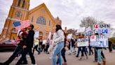 Photos: Protesters march against new Iowa immigration law in Waterloo