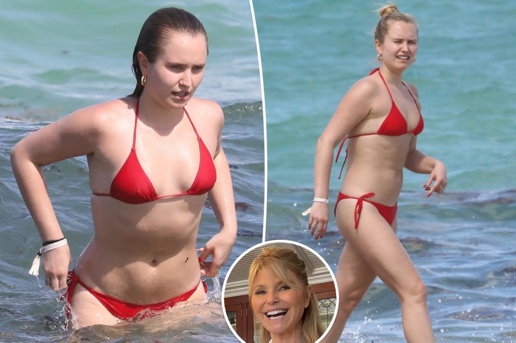 Christie Brinkley’s look-alike daughter Sailor stuns in red bikini while catching sun in Miami