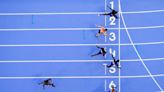 Olympics: Russell takes 100m hurdles gold by a whisker