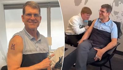 Jim Harbaugh keeps word, gets Michigan ‘15-0′ tattoo: ‘Impervious to pain’