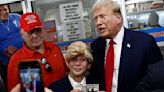 Trump superfan in suit and wig bursts into tears as he meets his idol