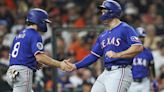 Rangers ride 6-run inning to win over Astros