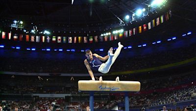 Olympic silver medallist gymnast Poujade dies at 51