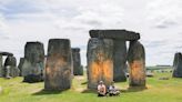 Environmental protesters spray Stonehenge with orange paint