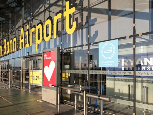 Flights suspended after climate protesters glue themselves to runway at busy airport