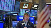 Stock market today: Indexes edge lower after hitting records on cooling inflation