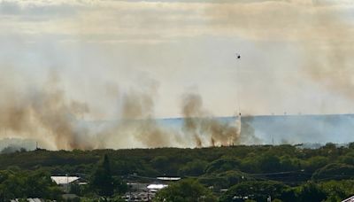 Fast-moving brush fire spreads on Hawaii's Kauai Island, prompting evacuations