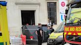 Police, firefighters and paramedics rush to city centre building site