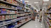 Consumers are spending less. Where's that economic slowdown? - Marketplace