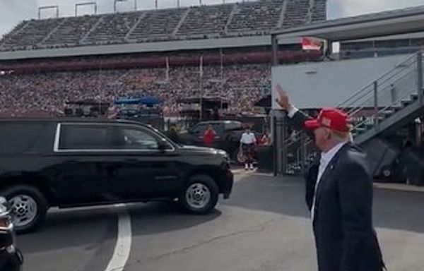 'Stage the moment': Trump accused of being 'caught waving at a non-existent audience'