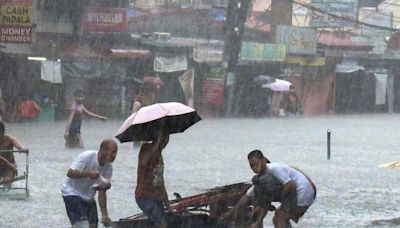 Taiwan prepares for strong typhoon as monsoon rains kill 13 in the Philippines