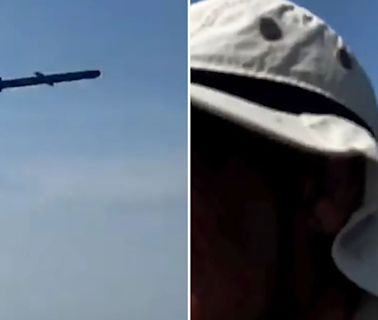 Moment low-flying Russian cruise missiles skim over fishermen’s heads