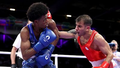 Paris 2024 Olympics: Refugee boxer Omad Ahmadisafa narrowly loses to Roscoe Hill in 51kg preliminary