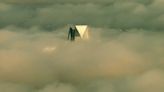 WATCH: Sky 5 shows Devon Tower peeking through low clouds
