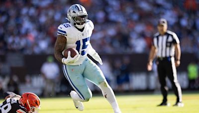 How did Dallas Cowboys running back Ezekiel Elliott fare in the team’s season opener?