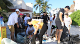 Llaman a concientizar; realizan jornada de limpieza en playa de Cancún