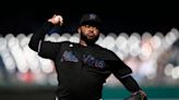 Cueto wins in his return as Burger hits 2 of the Marlins' 4 home runs in win over the Nationals
