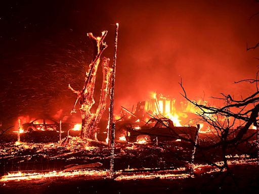 California firefighters continue battling wind-driven wildfire east of San Francisco