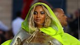 Ciara turns heads in a neon cloak and bodysuit at Vogue World Paris