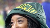 Simone Biles presented an amazing gift on the sideline Sunday from another notable Green Bay Packers fan