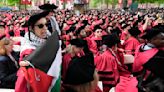 Group of graduates walk out of Harvard commencement chanting 'Free, free Palestine'