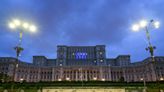 Romanian official tries to bite rival's face in parliament fight