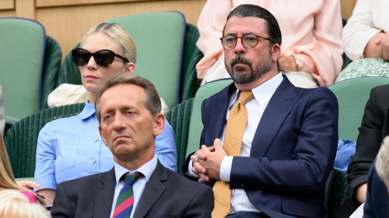 Dave Grohl Is Almost Unrecognizable in a Navy Suit and Sleek Ponytail at Wimbledon: See the Pics